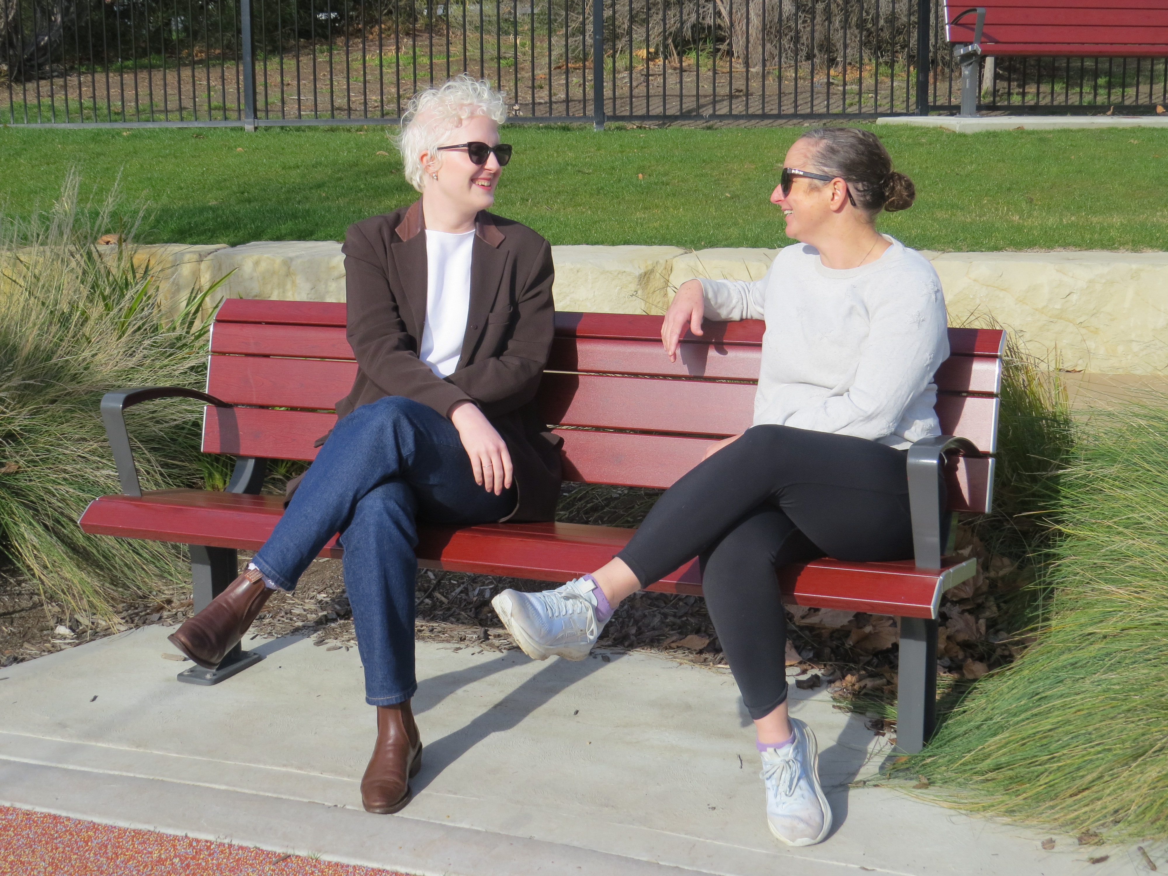 Mim and Savannah sitting on a bench
